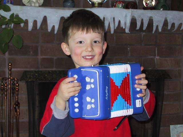 Jakob, age 4. He can really play it!